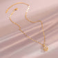 Strass-Anhänger mit goldfarbener Kupfer- und Titan-Stahlkette